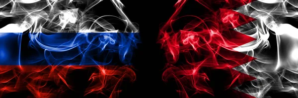 ロシア ロシア対バーレーン バーレーンの国旗 黒地に隔絶された煙旗 — ストック写真