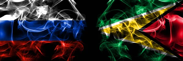 Russia Russian Guyana Flags Smoke Flag Placed Side Side Isolated — Stock Photo, Image