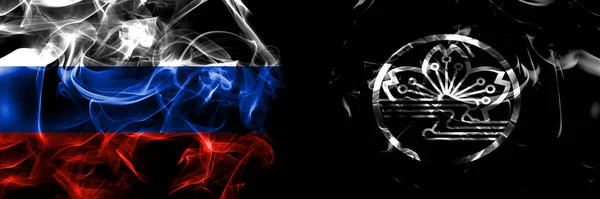 俄罗斯 俄罗斯对日本 北海道 伊布理 亚地旗 在黑色背景下并排隔离的烟雾旗 — 图库照片