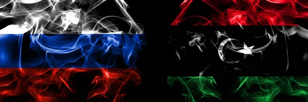 Russia Russian Libya Libyan Flags Smoke Flag Placed Side Side — Stock Photo, Image