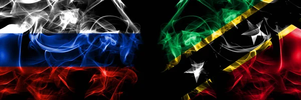 Rusya Rusya Saint Kitts Nevis Bayraklarına Karşı Siyah Arkaplanda Yan — Stok fotoğraf