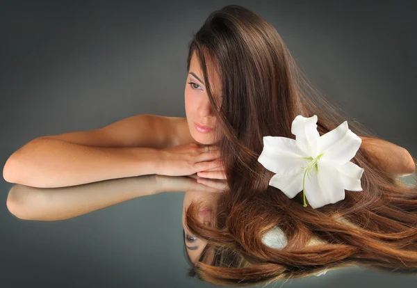 Long hair on grey — Stock Photo, Image