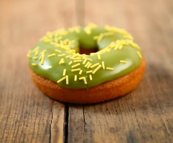 Donut on wooden — Stock Photo, Image