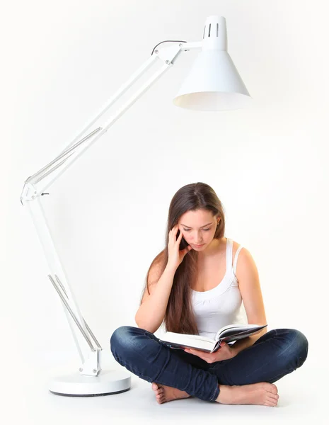 Student onder lamp — Stockfoto