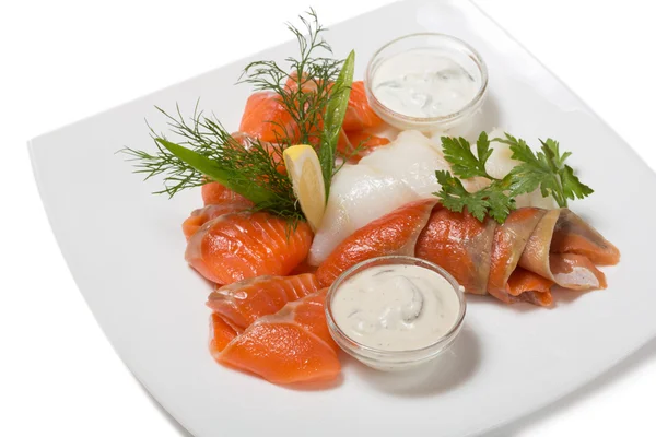 Cold appetizer of smoked halibut, salted trout, sockeye salmon s — Stock Photo, Image