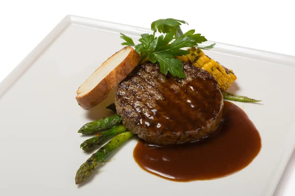 Beefsteak of filet of marbled beef with asparagus — Stock Photo, Image