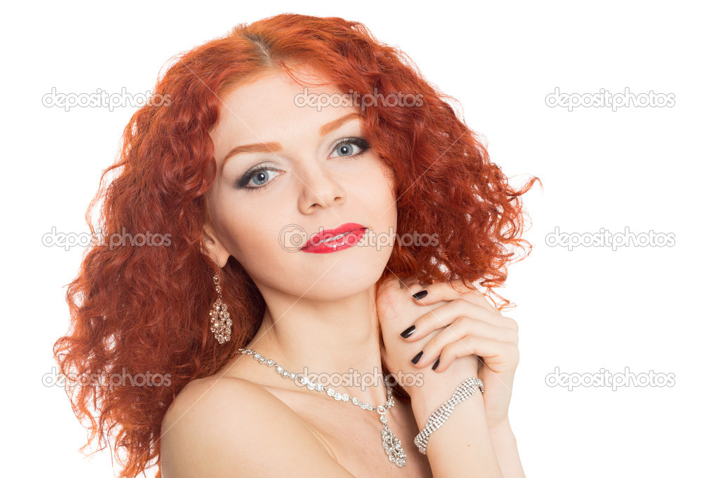 Smiling girl with curly red hair