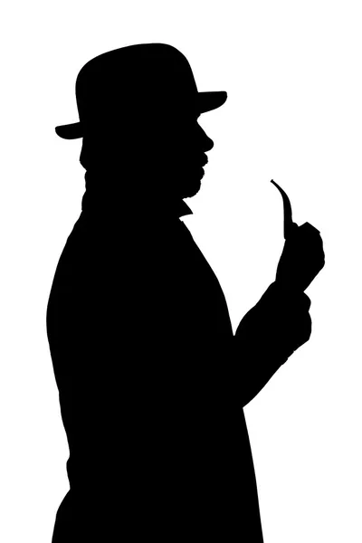 Silhouette of a man in a hat with a pipe. — Stock Photo, Image