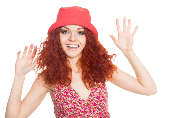 Joyful young woman in a red hat — Stock Photo, Image