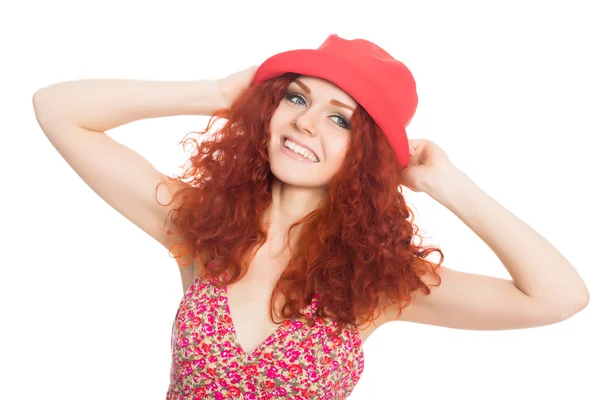 Menina alegre em um chapéu vermelho isolado no branco . — Fotografia de Stock