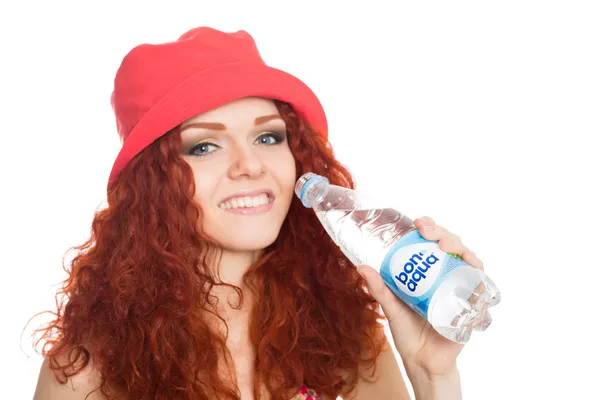 Girl holding a bottle of water BonAqua — Stock Photo, Image
