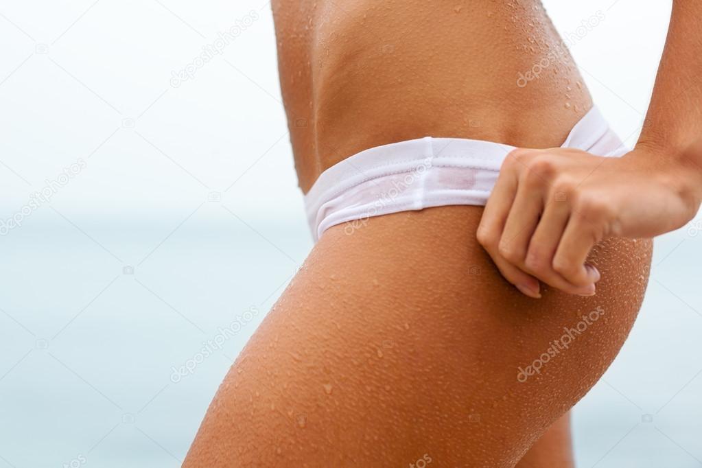 Girl removes panties sea 