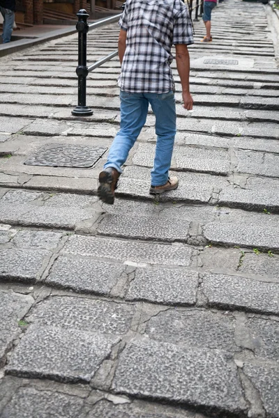 Man walking the rocky steps — Stock Photo, Image