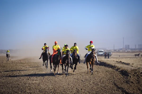 Байга. Конные скачки. Казахстан. — ストック写真