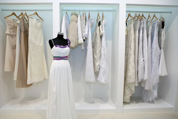 Collection of wedding dresses in the shop — Stock Photo, Image