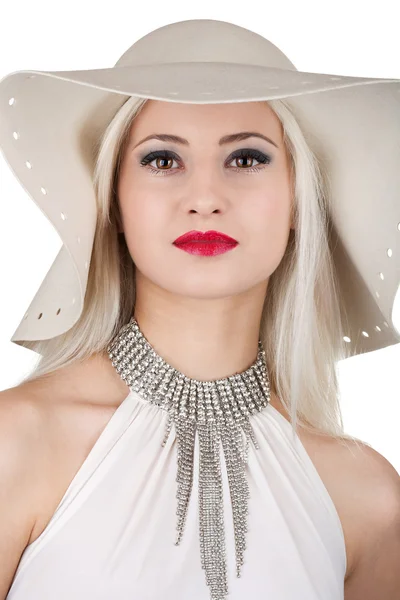Beautiful young woman with diamond necklace and a hat — Stock Photo, Image