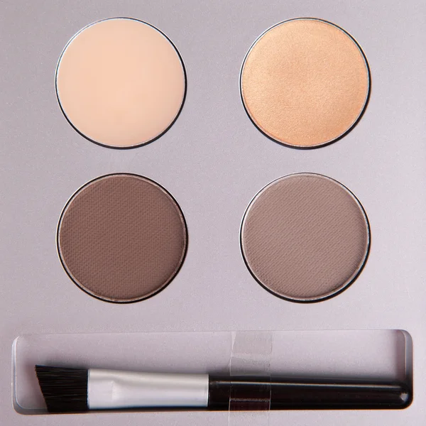 Set beige eyeshadows en applicator borstel — Stockfoto