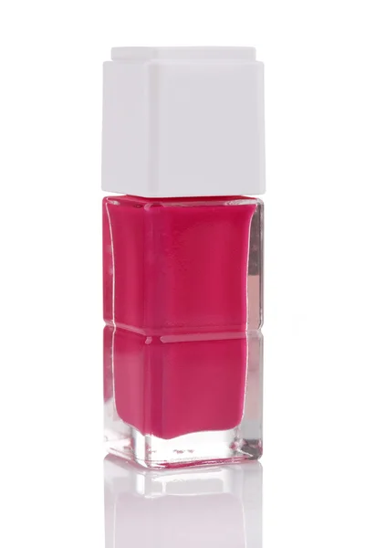 Frasco de esmalte rosa com reflexo isolado no backgr branco — Fotografia de Stock