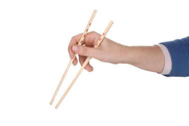 Female hand holding chopsticks with chinese inscription clipart