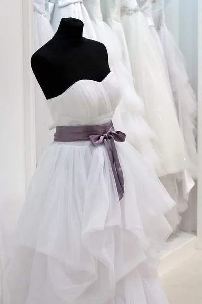 Wedding dress on a mannequin in the showroom — Stock Photo, Image