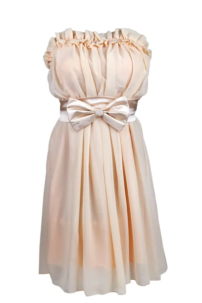 Beige cocktail dress with satin bow — Stock Photo, Image