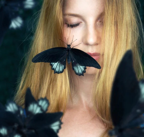 Butterfly on the face — Stock Photo, Image