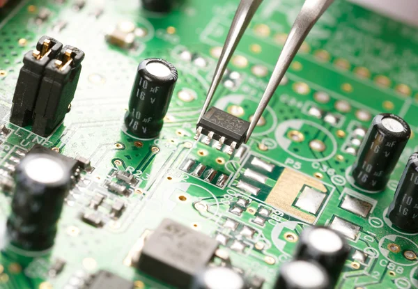 Assembling a circuit board — Stock Photo, Image