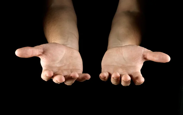 Handen geïsoleerd op zwarte achtergrond — Stockfoto