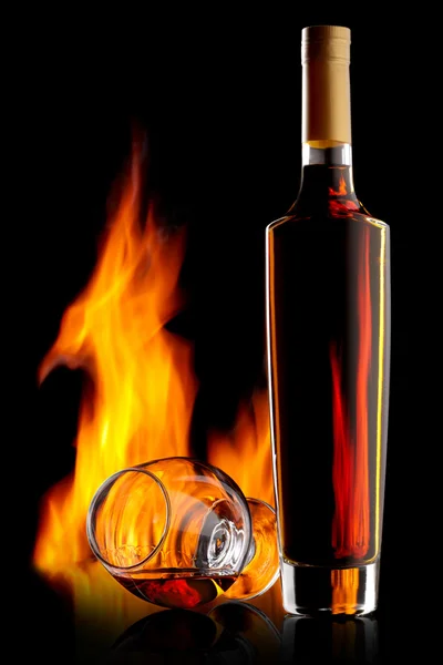 Bottle and glass of cognac — Stock Photo, Image