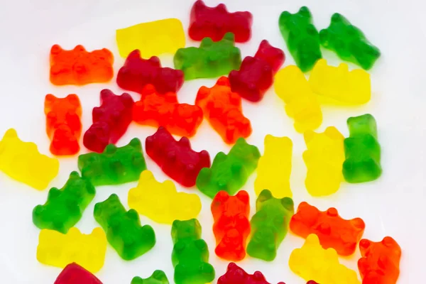 Colorful jelly gummy bears on the white background —  Fotos de Stock