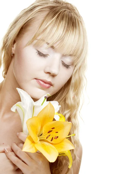 Beautiful blond girl with yellow lily — Stock Photo, Image