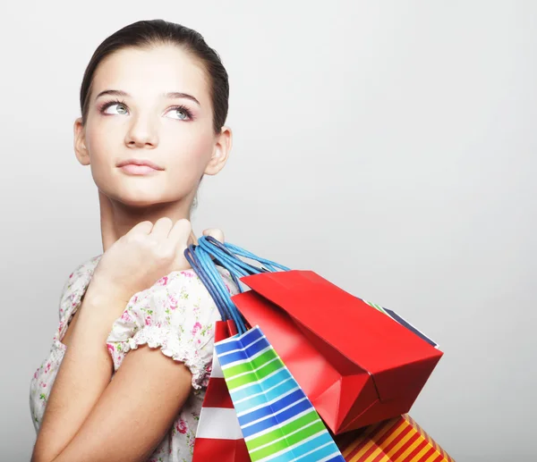 Compras mujer sosteniendo bolsas —  Fotos de Stock