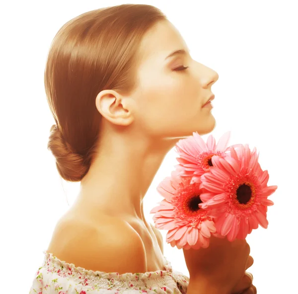 Beautiful young woman with gerber flowers — Stock Photo, Image