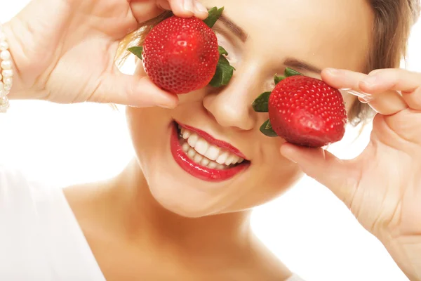 Fun woman with strawberry on the white background — Stock Photo, Image