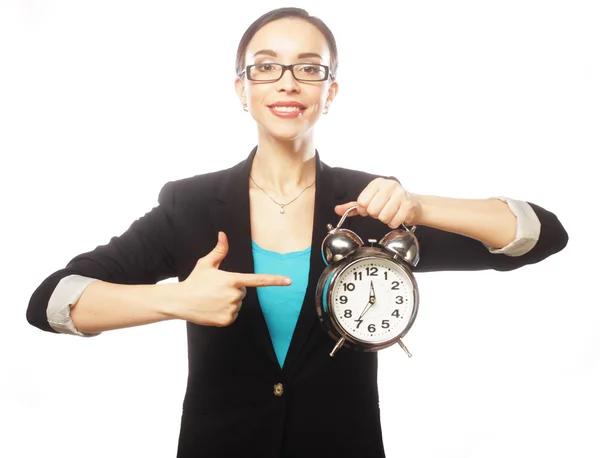 Affärskvinna glasögon håller väckarklocka — Stockfoto