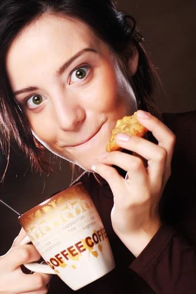 Woman with coffee and cookies — Stock Photo, Image