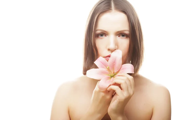 Mulher com flores rosa — Fotografia de Stock