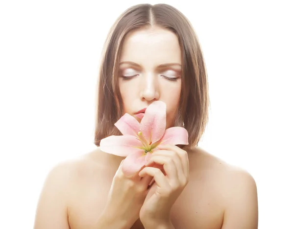 Frau mit rosa Blüten — Stockfoto