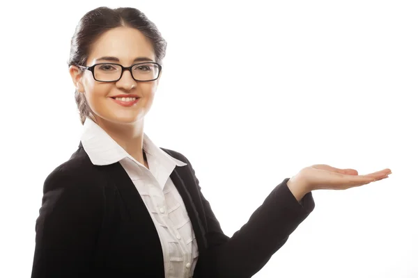 Young beautiful business woman showing blank area — Stock Photo, Image