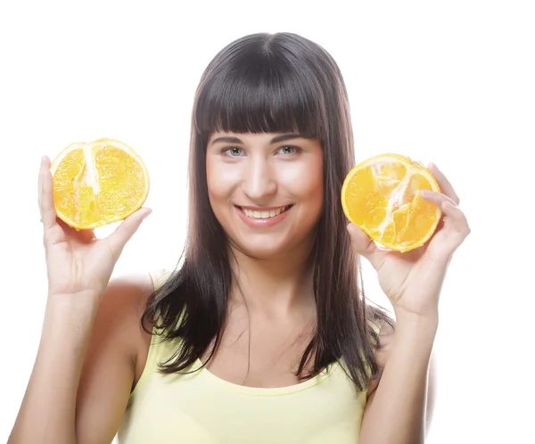 그녀의 손에 있는 오렌지와 여자 — 스톡 사진