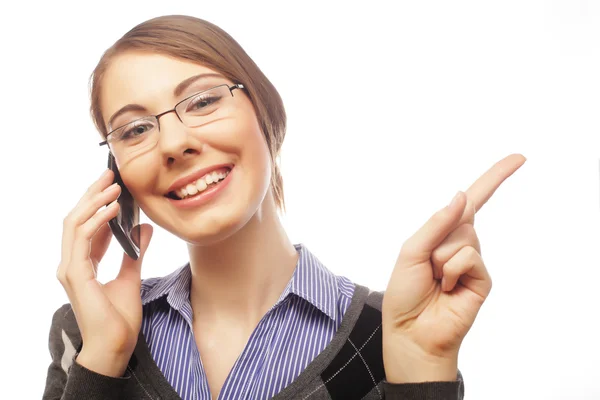 Woman with mobile smiling pointing up — Stock Photo, Image