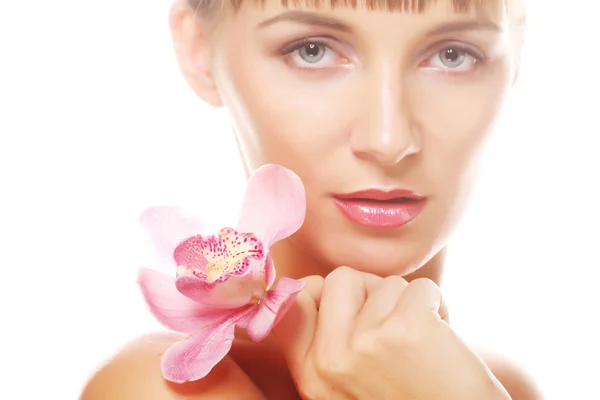 Donna con orchidea rosa — Foto Stock