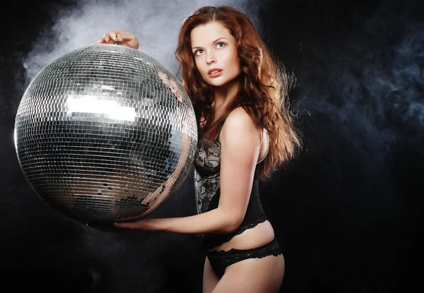 Dancer girl in smoke with disco ball — Stock Photo, Image