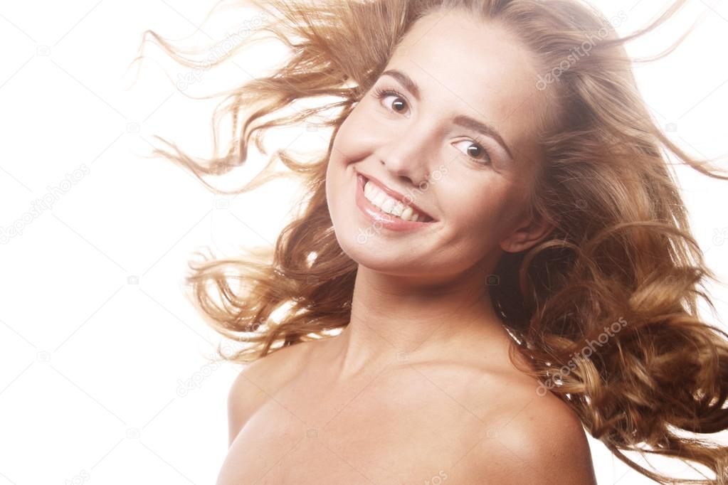 Woman model with windswept flying hair.