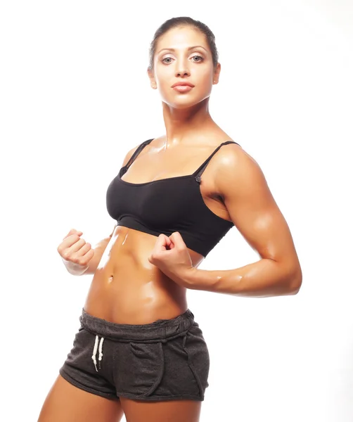 Fitness woman in black sports clothes — Stock Photo, Image