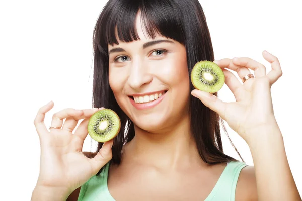 Happy woman holding kiwi — Stock Photo, Image