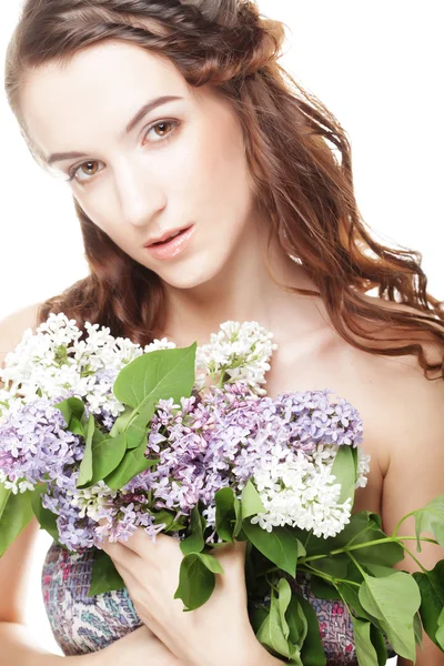 Muchacha de primavera con flores lila . — Foto de Stock