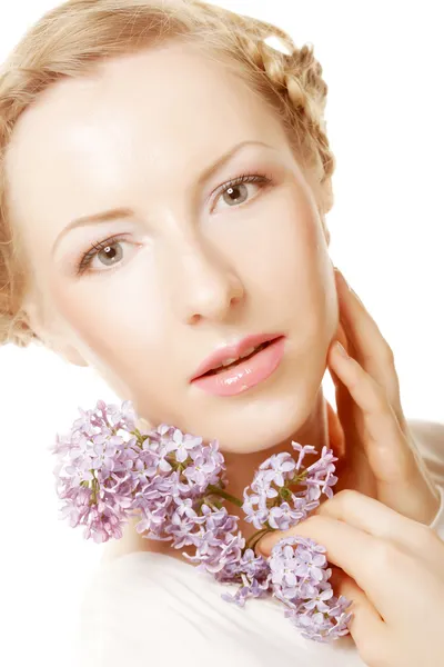 Spring girl with lilac flowers. — Stock Photo, Image