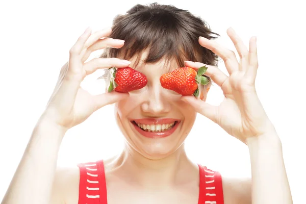 Kvinna med jordgubbe på den vita bakgrunden — Stockfoto