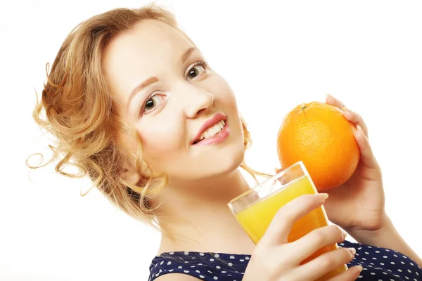 Woman holding orange — Zdjęcie stockowe